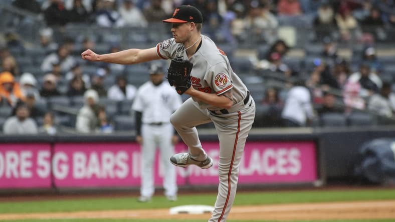 Oct 2, 2022; Bronx, New York, USA;  Baltimore Orioles starting pitcher Kyle Bradish (56) pitches in the first inning against the New York Yankees at Yankee Stadium. Mandatory Credit: Wendell Cruz-USA TODAY Sports
