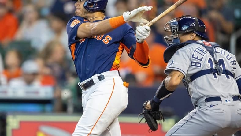 Oct 2, 2022; Houston, Texas, USA;  Houston Astros shortstop Jeremy Pena (3) hits a two run home run against the Tampa Bay Rays in the first inning at Minute Maid Park. Mandatory Credit: Thomas Shea-USA TODAY Sports