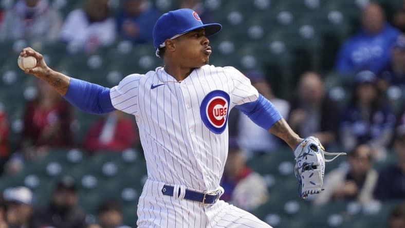 Oct 2, 2022; Chicago, Illinois, USA; Chicago Cubs starting pitcher Marcus Stroman (0) throws the ball against the Cincinnati Reds during the first inning at Wrigley Field. Mandatory Credit: David Banks-USA TODAY Sports