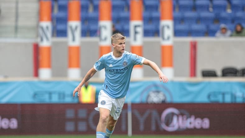 Oct 2, 2022; Harrison, New Jersey, USA; New York City FC midfielder Keaton Parks (55) passes the ball against Orlando City SC during the second half at Red Bull Arena. Mandatory Credit: Vincent Carchietta-USA TODAY Sports