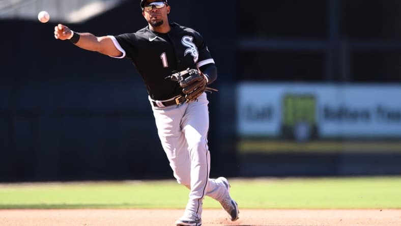 Oct 2, 2022; San Diego, California, USA; Chicago White Sox second baseman Elvis Andrus (1) throws to first base on a ground out by San Diego Padres shortstop Ha-Seong Kim (not pictured) during the fourth inning at Petco Park. Mandatory Credit: Orlando Ramirez-USA TODAY Sports
