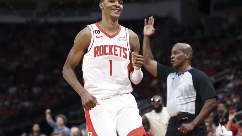 Oct 2, 2022; Houston, Texas, USA; Houston Rockets forward Jabari Smith Jr. (1) reacts after making a basket during the second quarter against the San Antonio Spurs at Toyota Center. Mandatory Credit: Troy Taormina-USA TODAY Sports