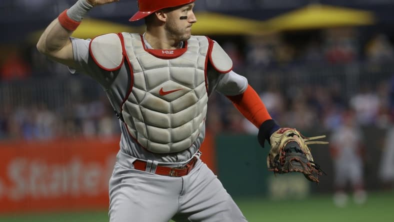 Oct 3, 2022; Pittsburgh, Pennsylvania, USA;  St. Louis Cardinals catcher Andrew Knizner (7) throws to first base to retire Pittsburgh Pirates third baseman Ke'Bryan Hayes (not pictured) during the first inning at PNC Park. Mandatory Credit: Charles LeClaire-USA TODAY Sports