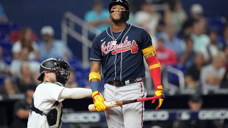 Oct 3, 2022; Miami, Florida, USA; Atlanta Braves right fielder Ronald Acuna Jr. (13) strikes out in the third inning against the Miami Marlins at loanDepot Park. Mandatory Credit: Jim Rassol-USA TODAY Sports
