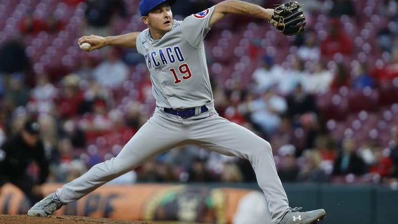 Oct 3, 2022; Cincinnati, Ohio, USA; Chicago Cubs starting pitcher Hayden Wesneski (19) throws a pitch against the Cincinnati Reds during the first inning at Great American Ball Park. Mandatory Credit: David Kohl-USA TODAY Sports