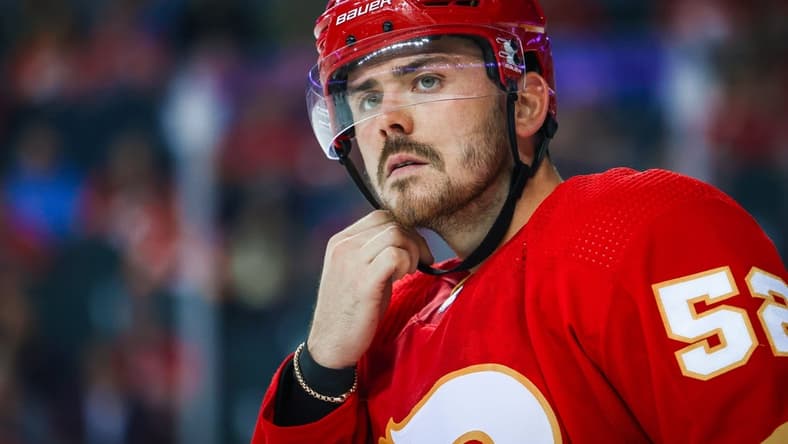 Oct 3, 2022; Calgary, Alberta, CAN; Calgary Flames defenseman MacKenzie Weegar (52) reacts against the Seattle Kraken during the second period at Scotiabank Saddledome. Mandatory Credit: Sergei Belski-USA TODAY Sports