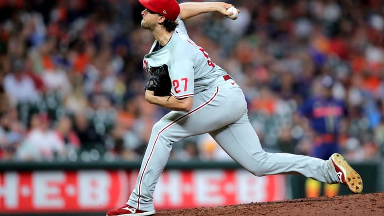Oct 3, 2022; Houston, Texas, USA; Philadelphia Phillies starting pitcher Aaron Nola (27) delivers a pitch against the Houston Astros during the seventh inning at Minute Maid Park. Mandatory Credit: Erik Williams-USA TODAY Sports