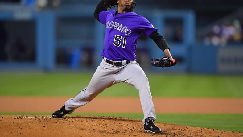 October 3, 2022; Los Angeles, California, USA; Colorado Rockies starting pitcher Jose Urena (51) throws against the Los Angeles Dodgers during the second inning at Dodger Stadium. Mandatory Credit: Gary A. Vasquez-USA TODAY Sports