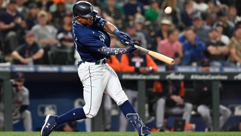 Oct 3, 2022; Seattle, Washington, USA; Seattle Mariners designated hitter Julio Rodriguez (44) hits a single against the Detroit Tigers during the third inning at T-Mobile Park. Mandatory Credit: Steven Bisig-USA TODAY Sports