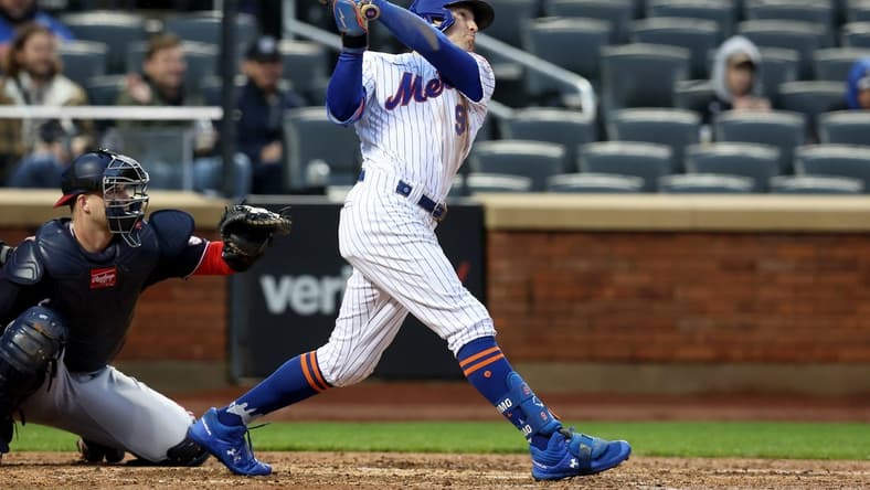 Oct 4, 2022; New York City, New York, USA; New York Mets center fielder Brandon Nimmo (9) follows through on a solo home run against the Washington Nationals during the fourth inning at Citi Field. Mandatory Credit: Brad Penner-USA TODAY Sports