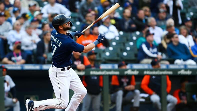 Oct 4, 2022; Seattle, Washington, USA; Seattle Mariners right fielder Mitch Haniger (17) follows through on a two-run home run against the Detroit Tigers during the third inning at T-Mobile Park. Mandatory Credit: Lindsey Wasson-USA TODAY Sports