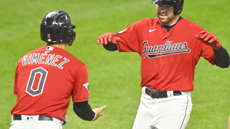 Oct 4, 2022; Cleveland, Ohio, USA; Cleveland Guardians first baseman Owen Miller (6) celebrates his two-run home run with second baseman Andres Gimenez (0) in the fifth inning against the Kansas City Royals at Progressive Field. Mandatory Credit: David Richard-USA TODAY Sports