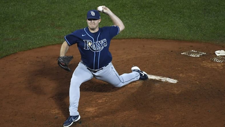 Oct 4, 2022; Boston, Massachusetts, USA; Tampa Bay Rays relief pitcher Colin Poche (38) pitches during the fifth inning against the Boston Red Sox at Fenway Park. Mandatory Credit: Bob DeChiara-USA TODAY Sports