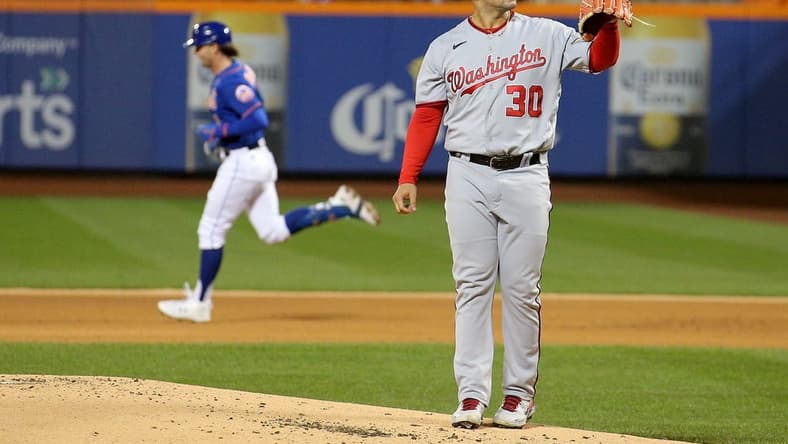 Oct 4, 2022; New York City, New York, USA; New York Mets right fielder Jeff McNeil (1) rounds the bases after hitting a solo home run against Washington Nationals starting pitcher Paolo Espino (30) during the first inning at Citi Field. Mandatory Credit: Brad Penner-USA TODAY Sports