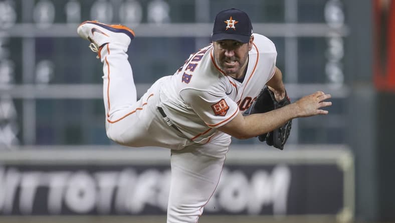 Oct 4, 2022; Houston, Texas, USA; Houston Astros starting pitcher Justin Verlander (35) delivers a pitch during the fifth inning against the Philadelphia Phillies at Minute Maid Park. Mandatory Credit: Troy Taormina-USA TODAY Sports