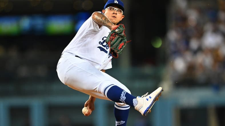 Oct 4, 2022; Los Angeles, California, USA; Los Angeles Dodgers starting pitcher Julio Urias (7) throws to the plate in the first inning against the Colorado Rockies at Dodger Stadium. Mandatory Credit: Jayne Kamin-Oncea-USA TODAY Sports