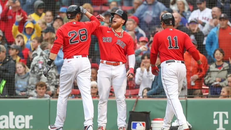 Oct 5, 2022; Boston, Massachusetts, USA; Boston Red Sox designated hitter JD Martinez (28) celebrates with Boston Red Sox right fielder Alex Verdugo (99) after hitting a three run home run during the first inning against the Tampa Bay Rays at Fenway Park. Mandatory Credit: Paul Rutherford-USA TODAY Sports