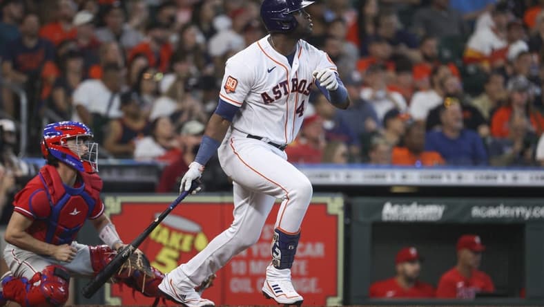Oct 5, 2022; Houston, Texas, USA; Houston Astros left fielder Yordan Alvarez (44) hits an RBI single during the third inning against the Philadelphia Phillies at Minute Maid Park. Mandatory Credit: Troy Taormina-USA TODAY Sports