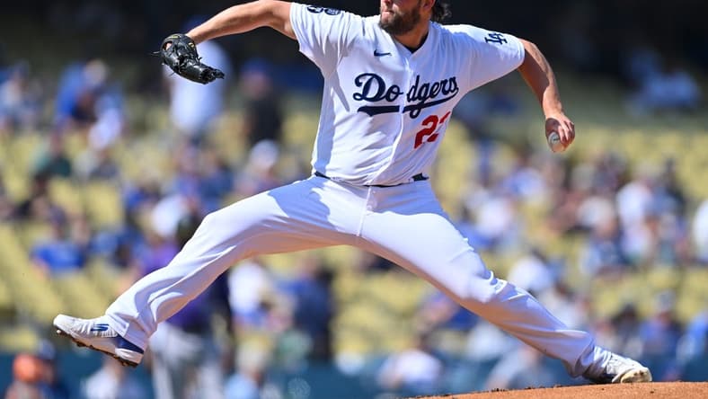 Oct 5, 2022; Los Angeles, California, USA;  Los Angeles Dodgers starting pitcher Clayton Kershaw (22) throws to the plate in the first inning against the Colorado Rockies at Dodger Stadium. Mandatory Credit: Jayne Kamin-Oncea-USA TODAY Sports