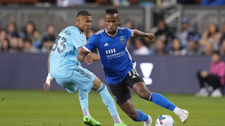 Oct 1, 2022; San Jose, California, USA; San Jose Earthquakes forward Jeremy Ebobisse (11) dribbles against Minnesota United midfielder Kervin Arriaga (33) during the first half at PayPal Park. Mandatory Credit: Darren Yamashita-USA TODAY Sports