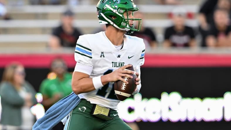 Sep 30, 2022; Houston, Texas, USA; Tulane Green Wave quarterback Kai Horton (12) looks to pass the ball during the first quarter against the Tulane Green Wave at TDECU Stadium in Houston, Texas. Mandatory Credit: Maria Lysaker-USA TODAY Sports