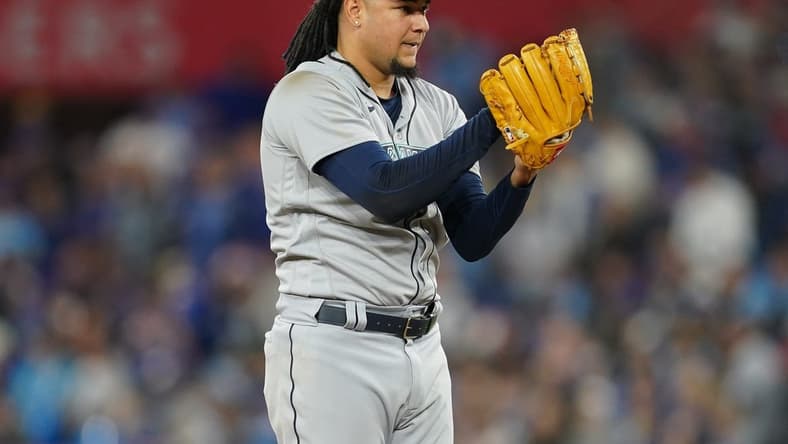 Oct 7, 2022; Toronto, Ontario, CAN; Seattle Mariners starting pitcher Luis Castillo (21) on the mound in the seventh inning against the Toronto Blue Jays during game one of the Wild Card series for the 2022 MLB Playoffs at Rogers Centre. Mandatory Credit: Nick Turchiaro-USA TODAY Sports