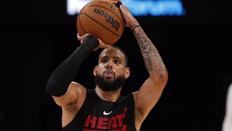 Oct 7, 2022; Memphis, Tennessee, USA; Miami Heat forward Caleb Martin (16) shoots prior to the game against the Memphis Grizzlies at FedExForum. Mandatory Credit: Petre Thomas-USA TODAY Sports