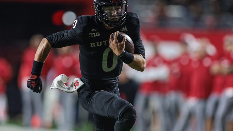 Oct 7, 2022; Piscataway, New Jersey, USA; Rutgers Scarlet Knights quarterback Noah Vedral (0) scores a rushing touchdown during the first half against the Nebraska Cornhuskers at SHI Stadium. Mandatory Credit: Vincent Carchietta-USA TODAY Sports