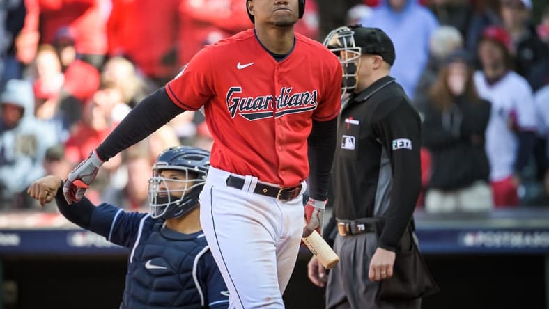 Oct 8, 2022; Cleveland, Ohio, USA; Cleveland Guardians right fielder Oscar Gonzalez (39) strikes out against the Tampa Bay Rays in the tenth inning during game two of the Wild Card series for the 2022 MLB Playoffs at Progressive Field. Mandatory Credit: Ken Blaze-USA TODAY Sports