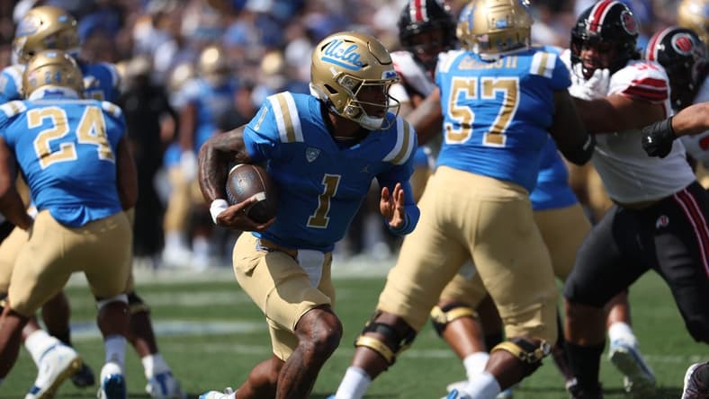 Oct 8, 2022; Pasadena, California, USA;  UCLA Bruins quarterback Dorian Thompson-Robinson (1) runs with a ball during the first quarter against the Utah Utes at Rose Bowl. Mandatory Credit: Kiyoshi Mio-USA TODAY Sports