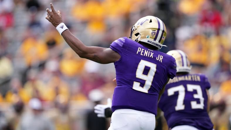 Oct 8, 2022; Tempe, Arizona, USA; Washington Huskies quarterback Michael Penix Jr. (9) throws a pass against the Arizona State Sun Devils during the first half at Sun Devil Stadium. Mandatory Credit: Joe Camporeale-USA TODAY Sports