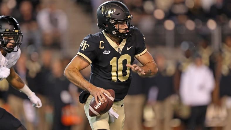Oct 8, 2022; Winston-Salem, North Carolina, USA; Wake Forest Demon Deacons quarterback Sam Hartman (10) looks to pass against the Army Black Knights during the first half at Truist Field. Mandatory Credit: Danny Wild-USA TODAY Sports