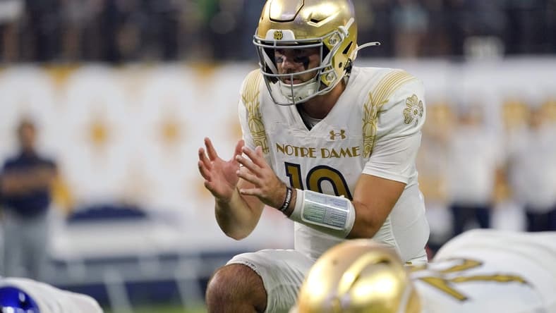 Oct 8, 2022; Paradise, Nevada, USA; Notre Dame Fighting Irish quarterback Drew Pyne (10) calls a play during the first half against the Brigham Young Cougars at Allegiant Stadium. Mandatory Credit: Lucas Peltier-USA TODAY Sports