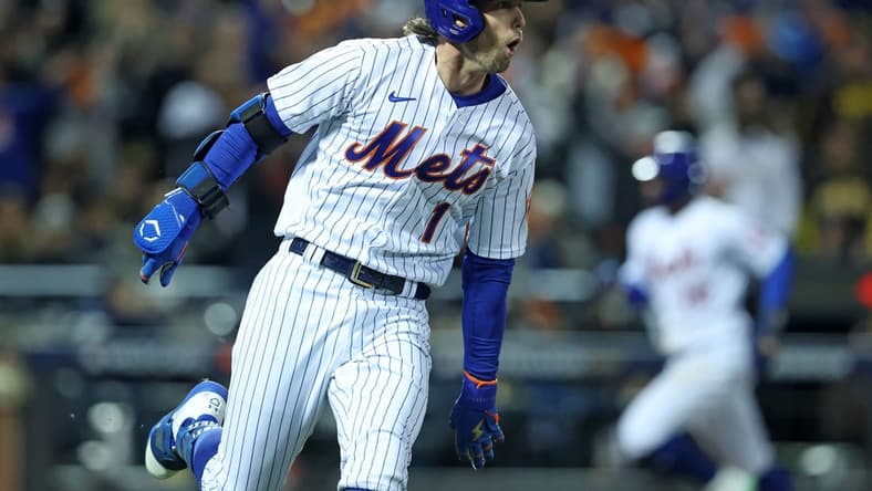 Oct 8, 2022; New York City, New York, USA; New York Mets second baseman Jeff McNeil (1) reacts after hitting a two run double against the San Diego Padres in the seventh inning during game two of the Wild Card series for the 2022 MLB Playoffs at Citi Field. Mandatory Credit: Brad Penner-USA TODAY Sports