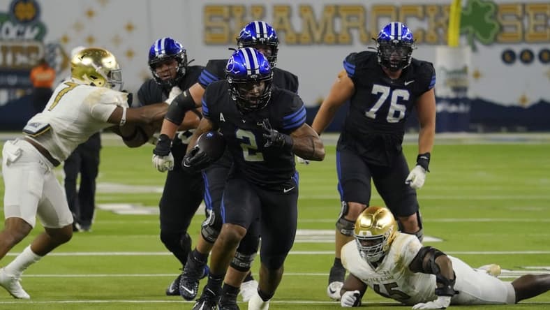 Oct 8, 2022; Paradise, Nevada, USA; Brigham Young Cougars running back Christopher Brooks (2) runs with the ball against the Notre Dame Fighting Irish during the second half at Allegiant Stadium. Mandatory Credit: Lucas Peltier-USA TODAY Sports