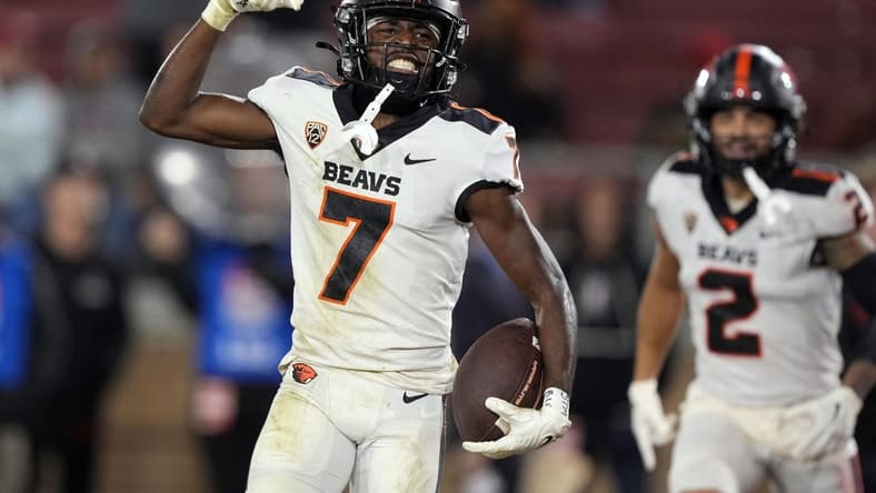 Oct 8, 2022; Stanford, California, USA; Oregon State Beavers wide receiver Silas Bolden (7) celebrates after scoring a touchdown against the Stanford Cardinal during the fourth quarter at Stanford Stadium. Mandatory Credit: Darren Yamashita-USA TODAY Sports