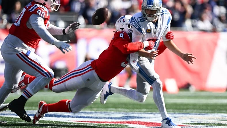 Oct 9, 2022; Foxborough, Massachusetts, USA; New England Patriots linebacker Matthew Judon (9) strip sacks Detroit Lions quarterback Jared Goff (16) during the first half at Gillette Stadium. Mandatory Credit: Brian Fluharty-USA TODAY Sports