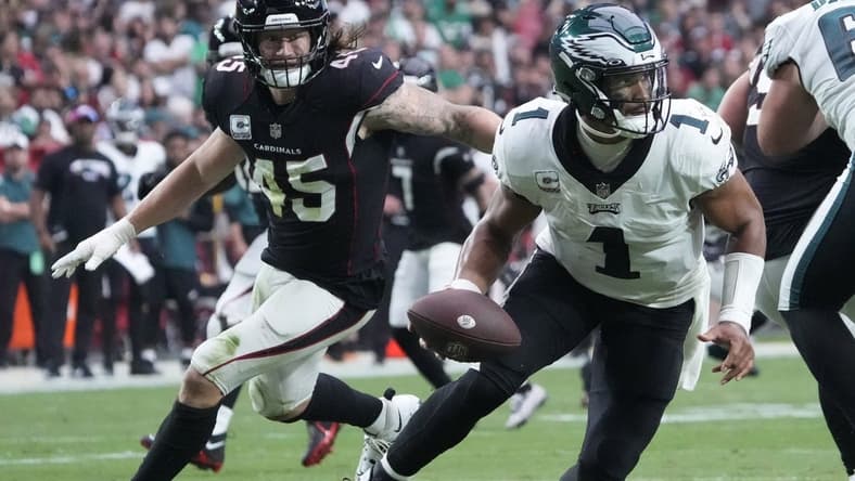 Oct 9, 2022; Glendale, Arizona, U.S.; Philadelphia Eagles quarterback Jalen Hurts (1) scrambles away from Arizona Cardinals linebacker Dennis Gardeck (45) during the second quarter at State Farm Stadium. Mandatory Credit: Michael Chow-USA TODAY Sports