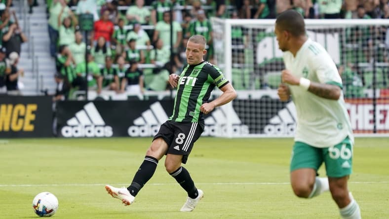 Oct 9, 2022; Austin, Texas, USA; Austin FC midfielder Alexander Ring (8) handles the ball as Colorado Rapids defender Lucas Esteves (66) defends during the first half at Q2 Stadium. Mandatory Credit: Scott Wachter-USA TODAY Sports