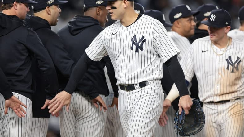 Oct 11, 2022; Bronx, New York, USA; New York Yankees first baseman Anthony Rizzo (48) celebrates after the Yankees beat the Cleveland Guardians in game one of the ALDS for the 2022 MLB Playoffs at Yankee Stadium. Mandatory Credit: Vincent Carchietta-USA TODAY Sports