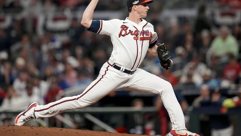 Oct 12, 2022; Atlanta, Georgia, USA; Atlanta Braves starting pitcher Kyle Wright (30) throws against the Philadelphia Phillies in the third inning during game two of the NLDS for the 2022 MLB Playoffs at Truist Park. Mandatory Credit: Dale Zanine-USA TODAY Sports