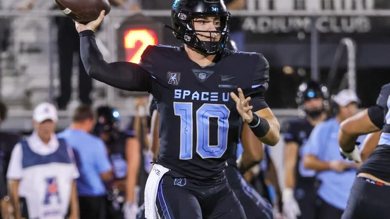 Oct 13, 2022; Orlando, Florida, USA; UCF Knights quarterback John Rhys Plumlee (10) throws a pass during the first quarter against the Temple Owls at FBC Mortgage Stadium. Mandatory Credit: Mike Watters-USA TODAY Sports