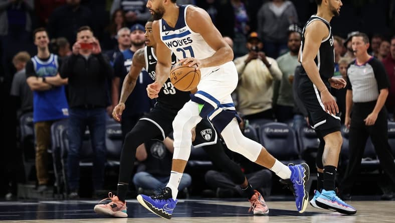 Oct 14, 2022; Minneapolis, Minnesota, USA; Minnesota Timberwolves center Rudy Gobert (27) dribbles the ball during the first quarter against the Brooklyn Nets at Target Center. Mandatory Credit: Matt Krohn-USA TODAY Sports