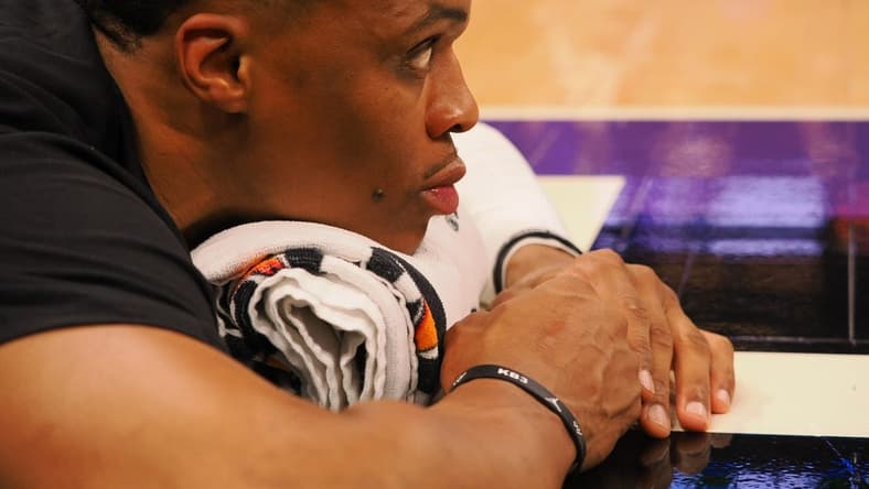 Oct 14, 2022; Sacramento, California, USA; Los Angeles Lakers point guard Russell Westbrook (0) stretches on the court before the game against the Sacramento Kings at Golden 1 Center. Mandatory Credit: Kelley L Cox-USA TODAY Sports