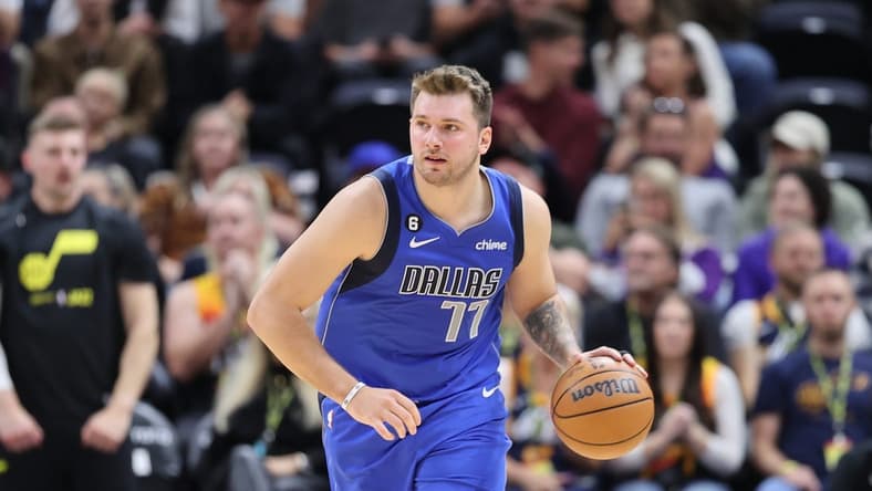 Oct 14, 2022; Salt Lake City, Utah, USA; Dallas Mavericks guard Luka Doncic (77) brings the ball up the court against the Utah Jazz in the second quarter at Vivint Arena. Mandatory Credit: Rob Gray-USA TODAY Sports