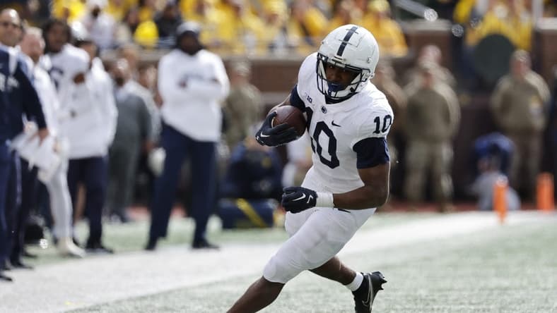 Oct 15, 2022; Ann Arbor, Michigan, USA; Penn State Nittany Lions running back Nicholas Singleton (10) rushes in the second half against the Michigan Wolverines at Michigan Stadium. Mandatory Credit: Rick Osentoski-USA TODAY Sports