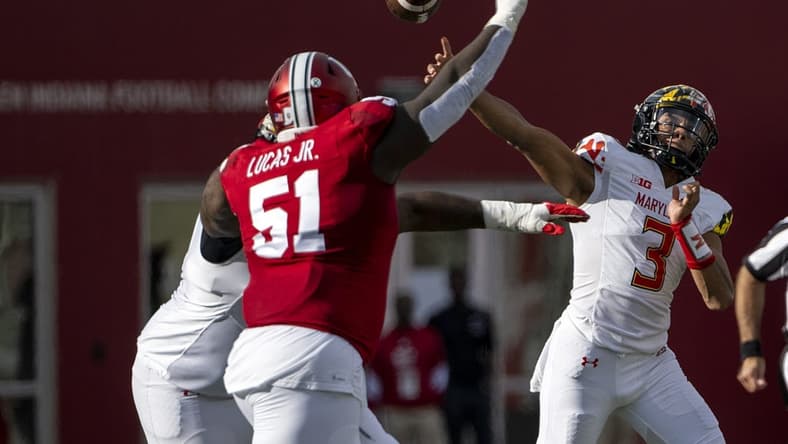 Oct 15, 2022; Bloomington, Indiana, USA; Maryland Terrapins quarterback Taulia Tagovailoa (3) throws the ball over Indiana Hoosiers defensive lineman Patrick Lucas Jr. (51) during the second quarter at Memorial Stadium. Mandatory Credit: Marc Lebryk-USA TODAY Sports