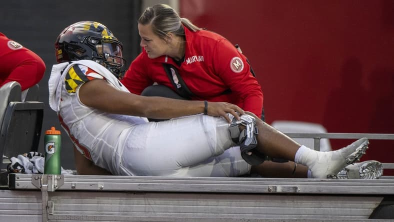 Oct 15, 2022; Bloomington, Indiana, USA; Maryland Terrapins quarterback Taulia Tagovailoa (3) is carted off of the filed with a knee injury during the second half against the Indiana Hoosiers at Memorial Stadium. Mandatory Credit: Marc Lebryk-USA TODAY Sports