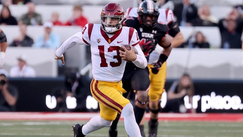 Oct 15, 2022; Salt Lake City, Utah, USA; USC Trojans quarterback Caleb Williams (13) runs against the Utah Utes in the first quarter at Rice-Eccles Stadium. Mandatory Credit: Rob Gray-USA TODAY Sports
