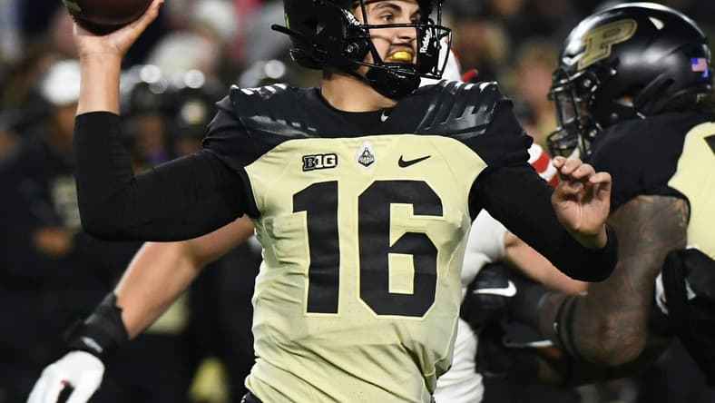 Oct 15, 2022; West Lafayette, Indiana, USA; Purdue Boilermakers quarterback Aidan O'Connell (16) throws a pass during the second half at Ross-Ade Stadium. Mandatory Credit: Robert Goddin-USA TODAY Sports